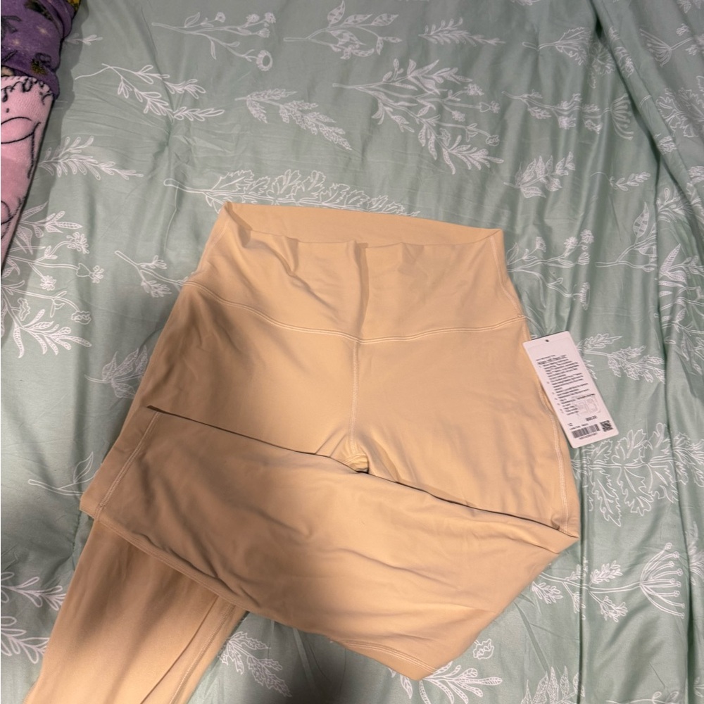 size 12 Lululemon Athletica Cream leggings